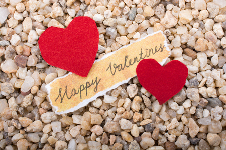 Love icon and Valentine's day wording on torn paperの写真素材