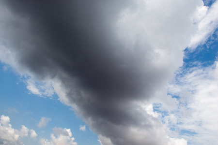 Dark and grey clouds are in the skyの写真素材