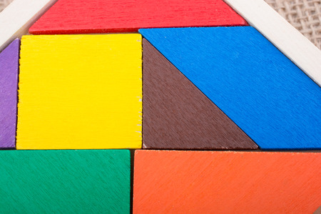 Colorful pieces of a square tangram puzzleの写真素材