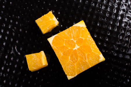 A view of a juicy, sweet and ripe cut orange fruitの写真素材