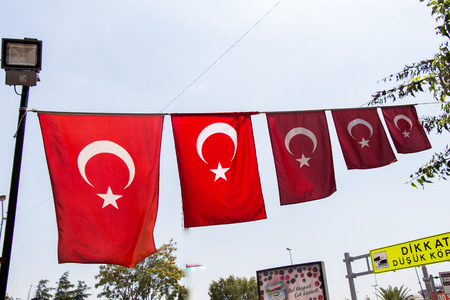 Turkish national flag hang on a pole in open airの写真素材