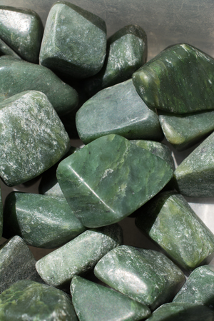 jade gem stone as natural mineral rock specimenの写真素材