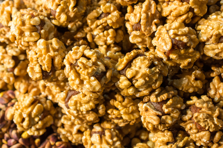 Pile of whole fresh walnuts without nutshellsの写真素材