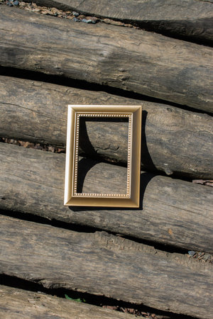 Blank wooden picture  frame on a background
