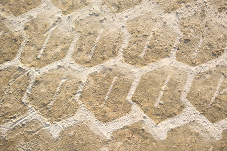 Tire tracks tire marks on Concrete  as abstract grunge texture