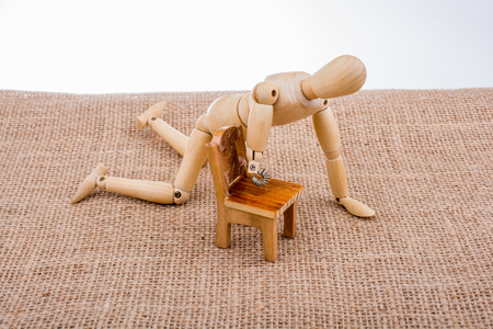 Little man figurine  made of wood in viewの写真素材