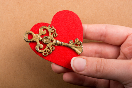 Retro styled decorative key  and paper heart shapeの写真素材