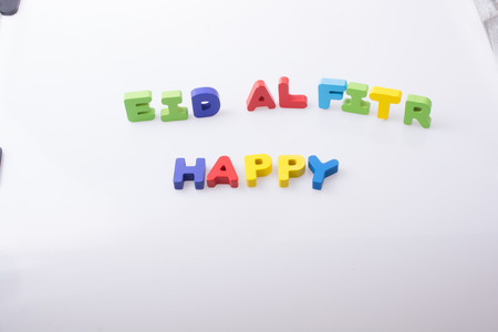 the word EID EL FITR  written with colorful letter blocksの写真素材