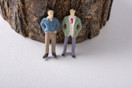 Tiny figurine of man miniature model in viewの写真素材