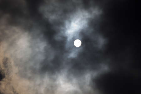 Dark and grey clouds are in the skyの写真素材