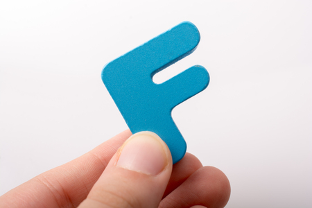 Letter cube of Fof  Alphabet made of woodの写真素材