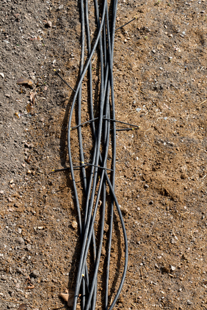 Irrigation system using sprinklers in a cultivated field for Wateringの写真素材
