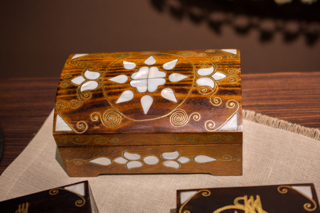 Ancient style wooden treasure chest with mother of pearl inlayの写真素材