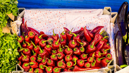 Fresh red pepper found at the market standの写真素材