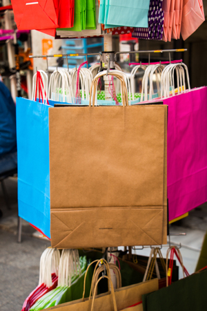 One simple color paper shopping bag in the market placeの写真素材