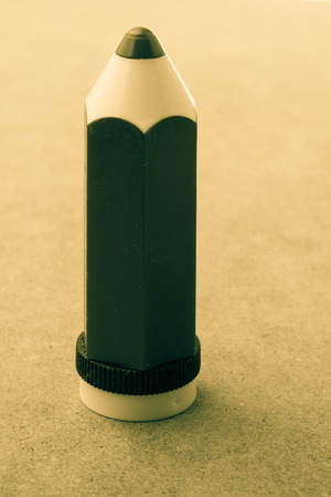 Back to school theme with a model penの写真素材