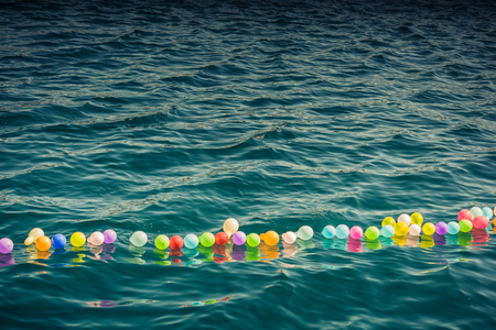 Balloon on a string  on water for shooting gameの写真素材