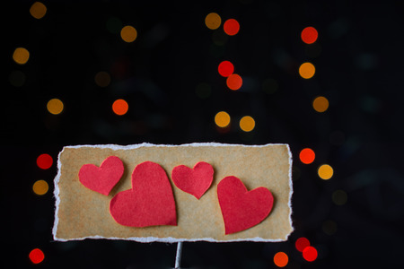 Valentine's day wording on torn paper as Love conceptの写真素材