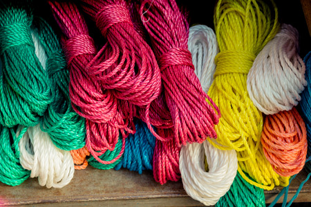 Bundle of colorfulrope  in view in a market placeの写真素材