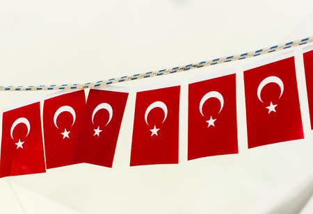 Turkish national flag in open air on a ropeの写真素材