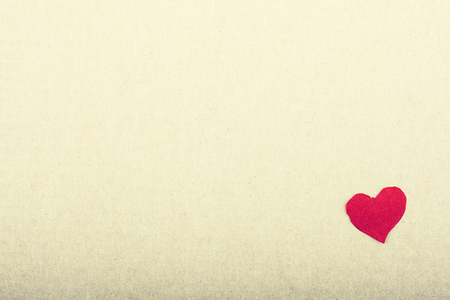 Love concept with a red heart shaped paper in viewの写真素材