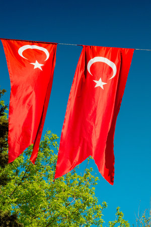 Turkish national flag hang in view in open air