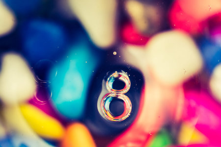 Bubbles on Colorful paint on  glass background