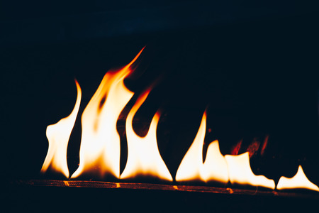 The yellow flames in a stone oven in displayの写真素材