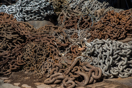 Heap of rusty metal chainの写真素材