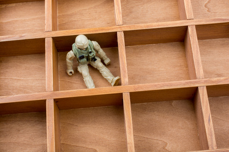 Soldier figurine in wooden box in the viewの写真素材