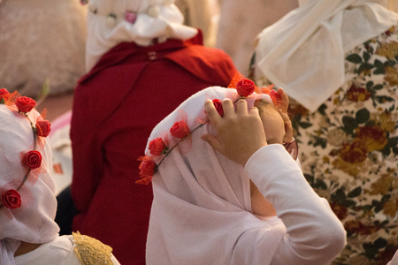Small girls with hijab in a big mosqueの写真素材