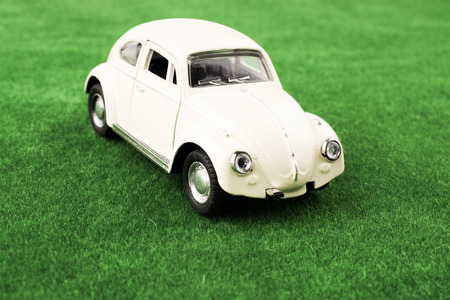 Toy car as a transportation devices on backgroundの写真素材