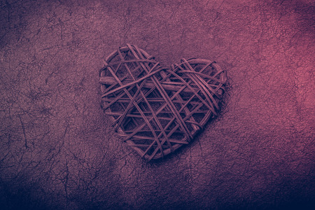 Handmade straw heart or valentines day object in viewの写真素材