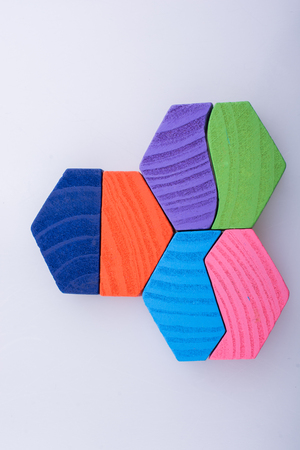 Colorful wooden pieces of a logic puzzleの写真素材