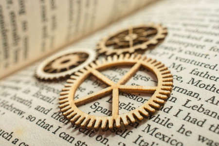 The concept of business gear wheels placed on book page