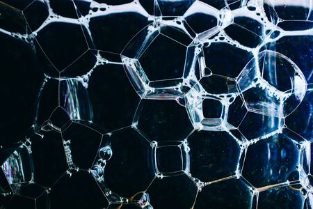 Oil bubbles inside water base form patternsの写真素材