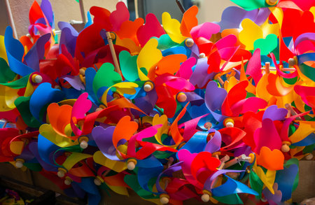 Rainbow colored pinwheels on sale in the view