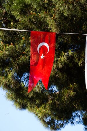 Turkish national flag in open air on a ropeの写真素材