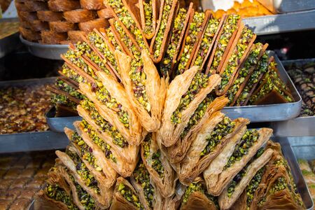 Traditional Turkish dessert Baklava stuffed vith pistachio from Istanbul Turkeyの写真素材