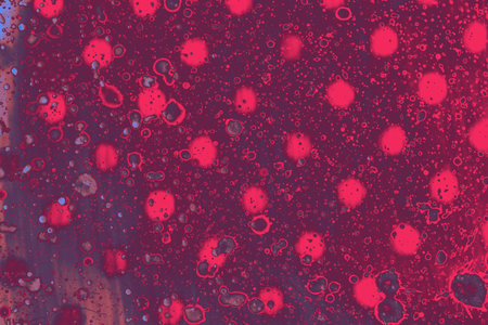 Abstract spots and stains on background formed by splashing watercolor
