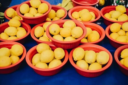 Lemons  Citrus fruits on a market as texture or backgroundの写真素材