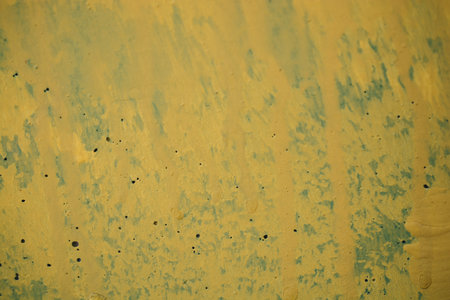 Rough colorful paint dripping  grunge texture of wall