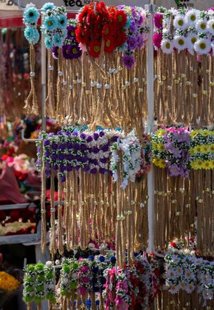 Head crown made of beautiful fake flowers wreathの写真素材