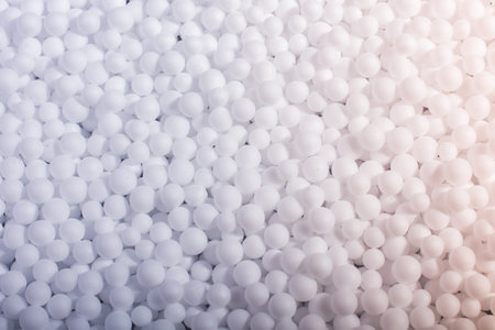 White little polystyrene foam balls as background