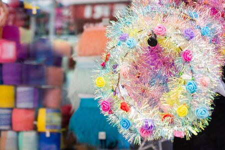 Head crown made of beautiful fake flowers wreathの写真素材