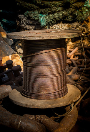 Metal wire roll close-up. Pattern of cables in view.