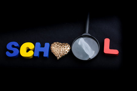 Education concept by School lettering  with colorful wooden letters