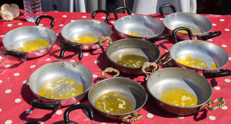 Set of Frying pans with piece of melting butter