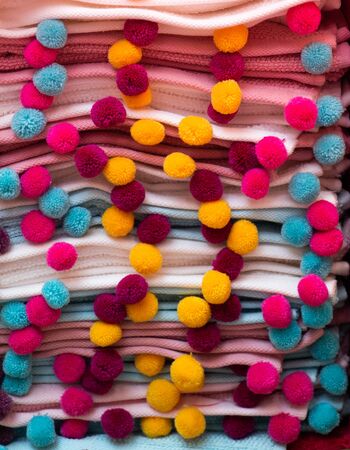 Collection of  fluffy pompons. The concept of touch, tactility, feelings.の写真素材