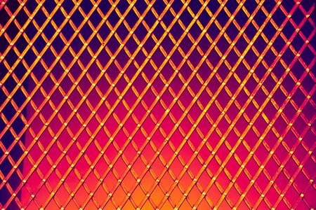 Close up of a part of decorative colorful wooden fenceの写真素材